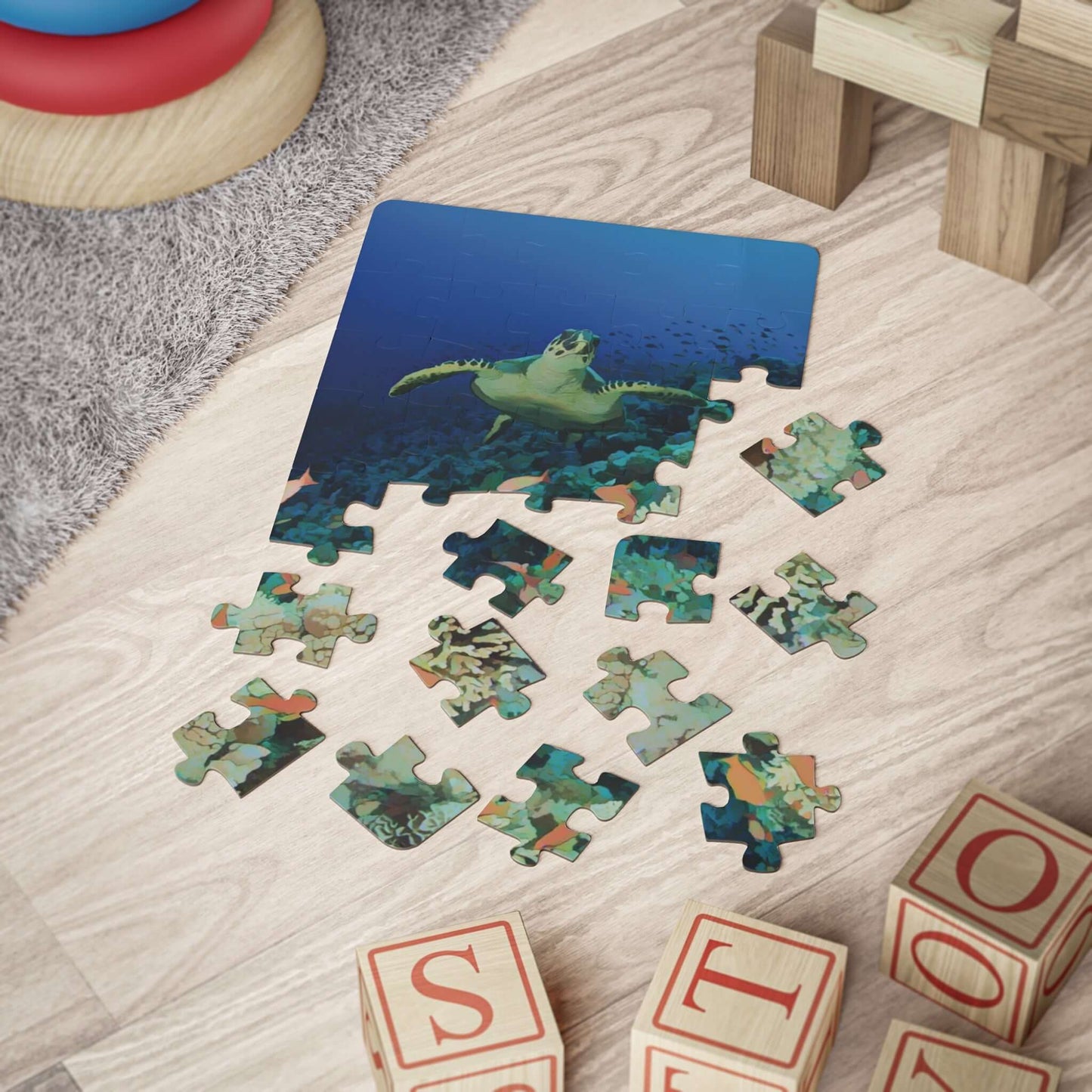 Underwater Adventure Puzzle pieces spread out, featuring a sea turtle and vibrant marine life, eco-friendly educational toy.