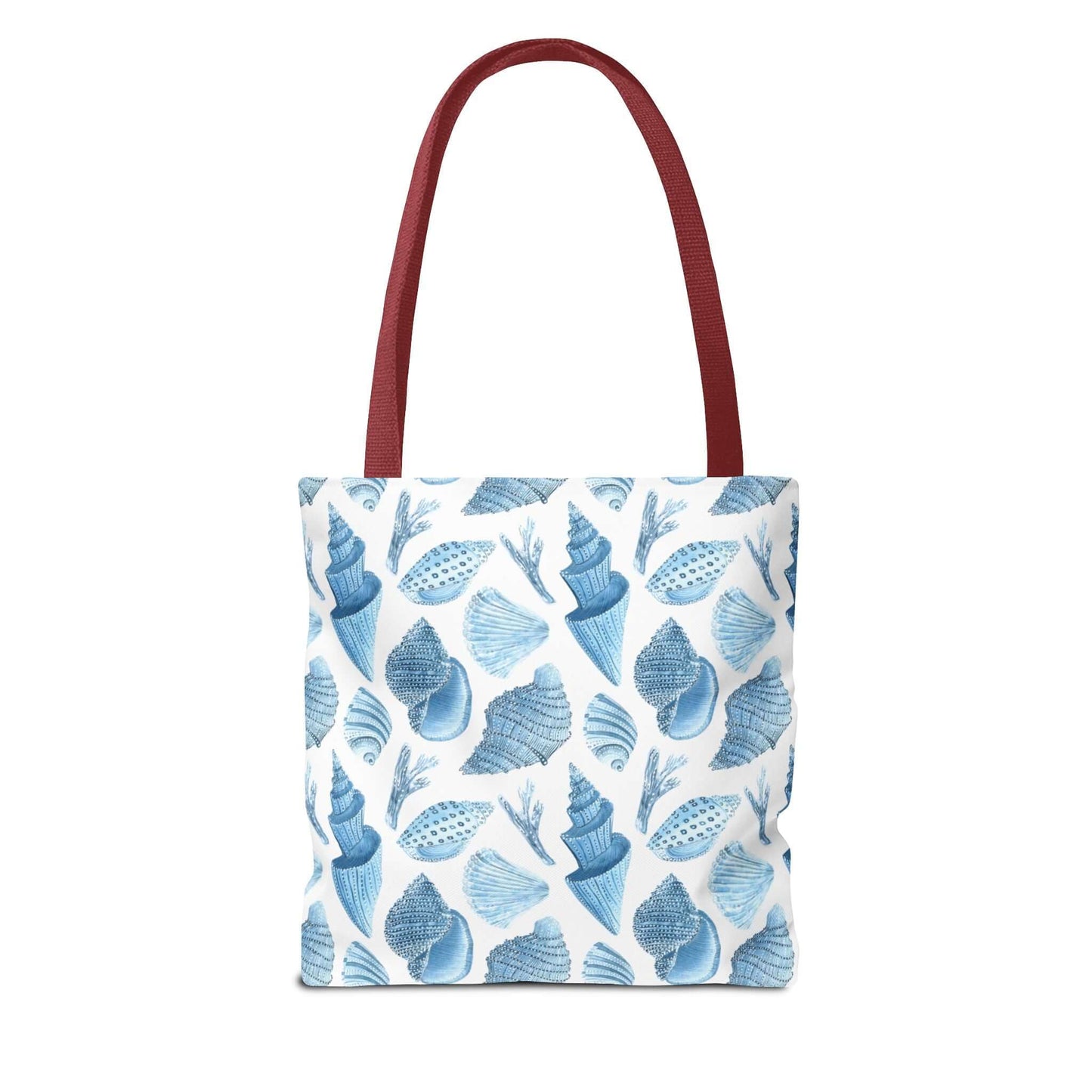 Beachy tote bag featuring blue ocean seashells print and sturdy red straps, perfect for eco-friendly outings.