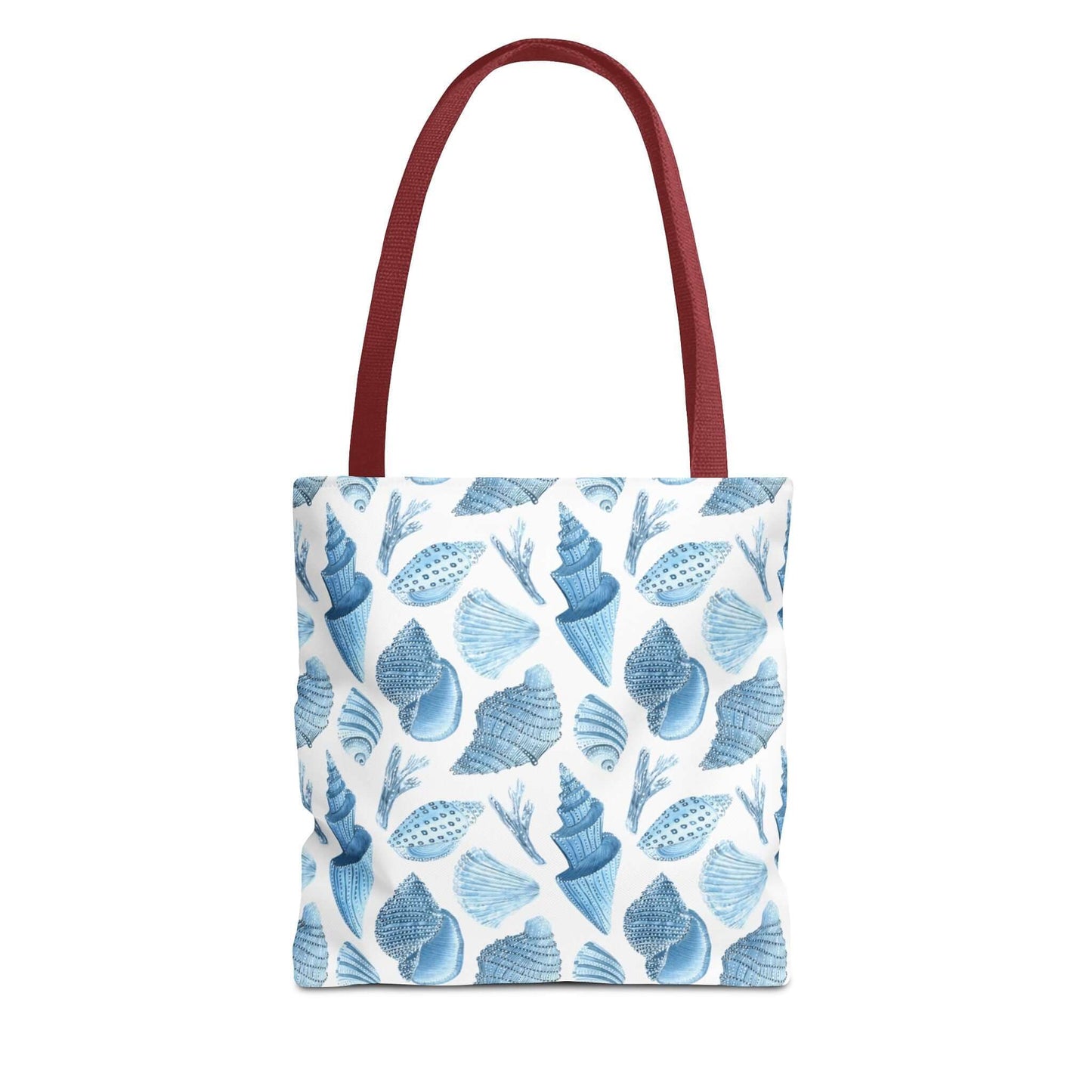 Beachy tote bag with ocean seashells print and red handles, perfect for eco-friendly outings and stylish beach days.
