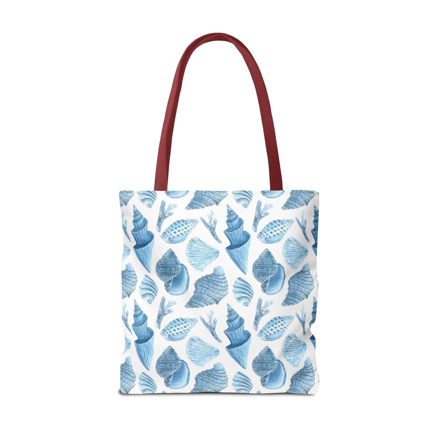 Beachy tote bag with ocean seashells print and red straps, perfect for eco-friendly outings.