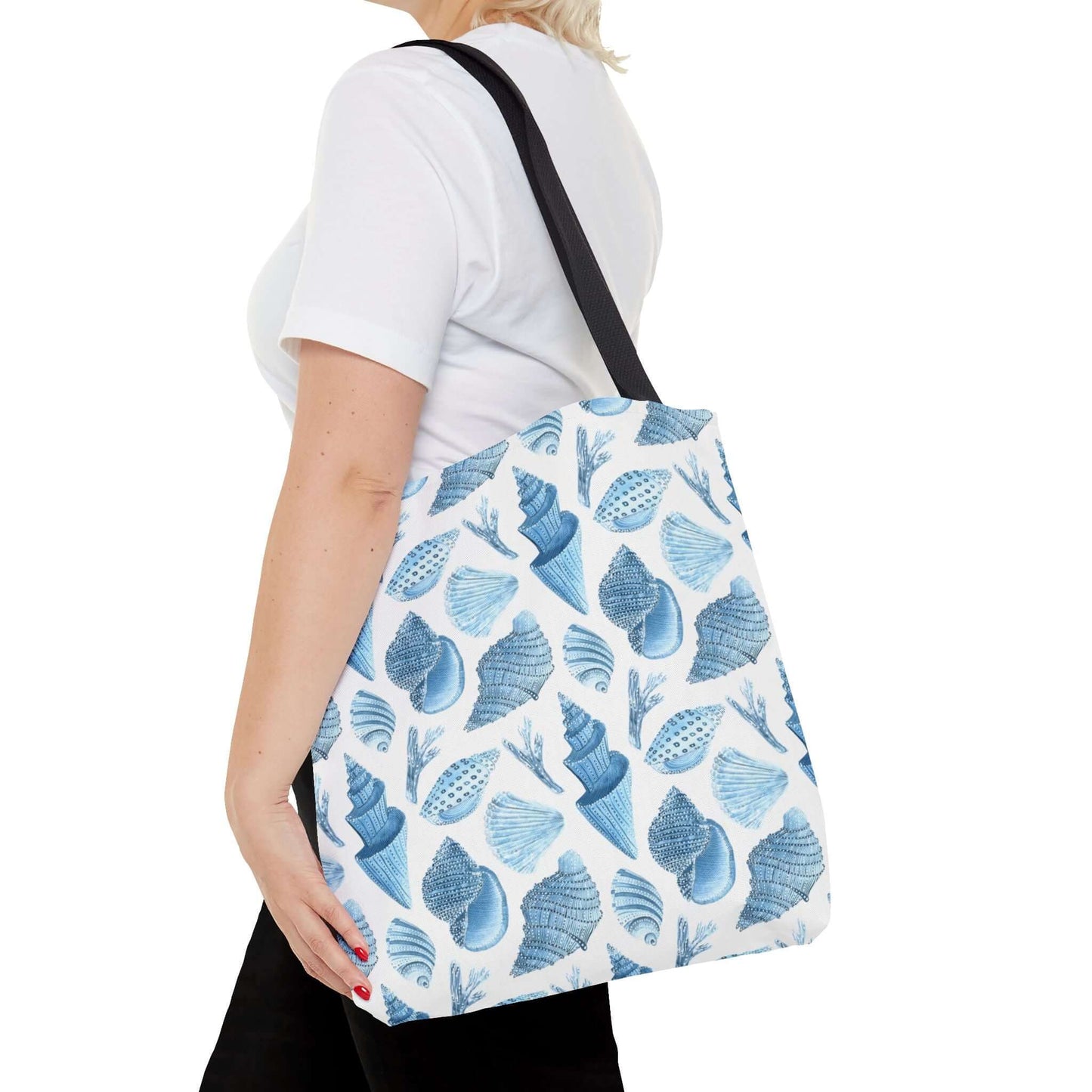 Stylish beachy tote bag with ocean seashells print, perfect for eco-friendly outings and shopping.