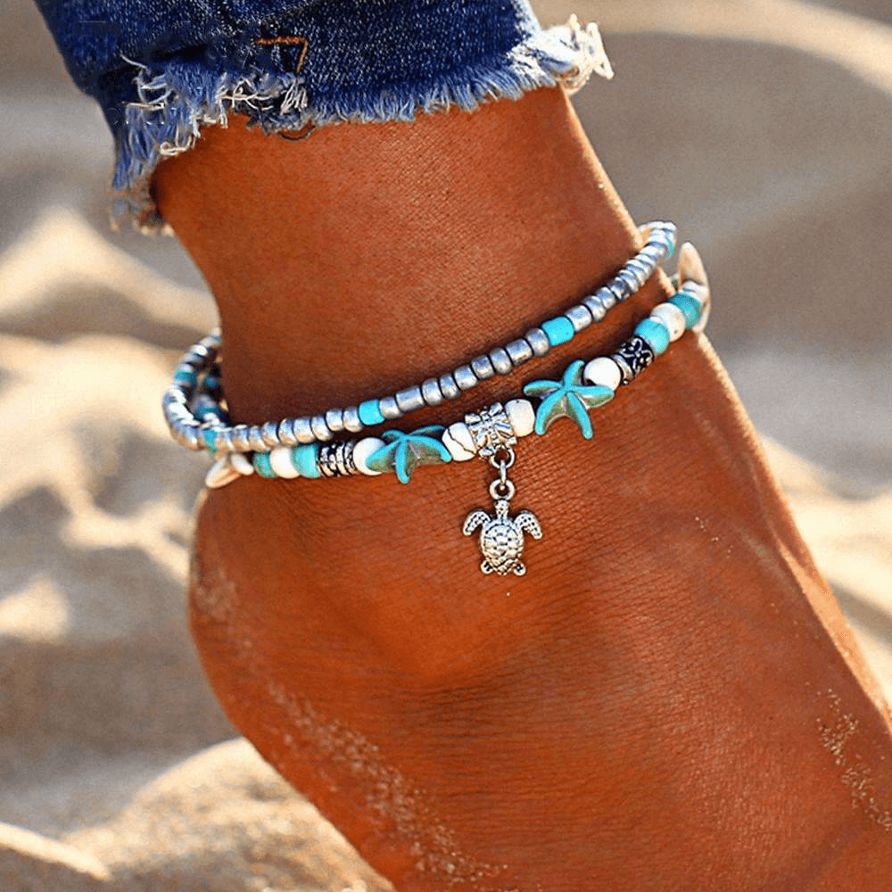 Ocean theme double layer anklet featuring turtle charm, perfect for beach lovers with 100% polyester in 5 colors.