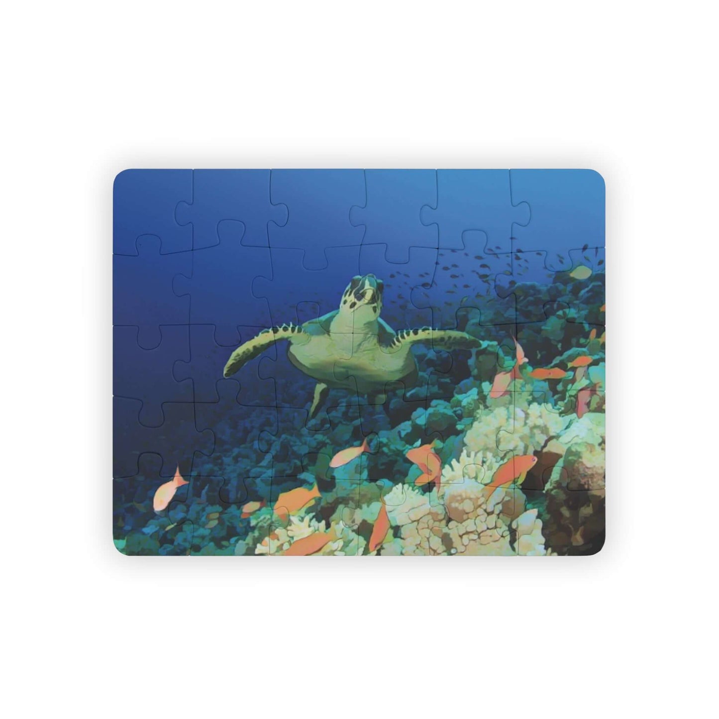 Colorful underwater puzzle featuring a sea turtle swimming among vibrant coral and fish, perfect for kids' learning.