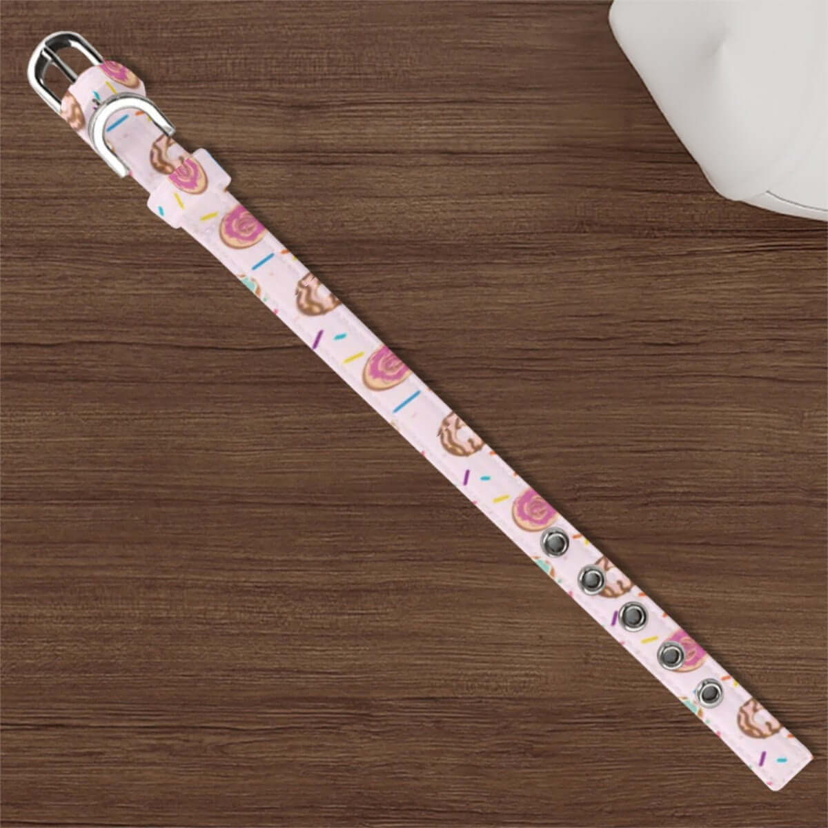 Adjustable pink donut sprinkle collar for small and medium dogs and cats, featuring a cute design on durable polyester.