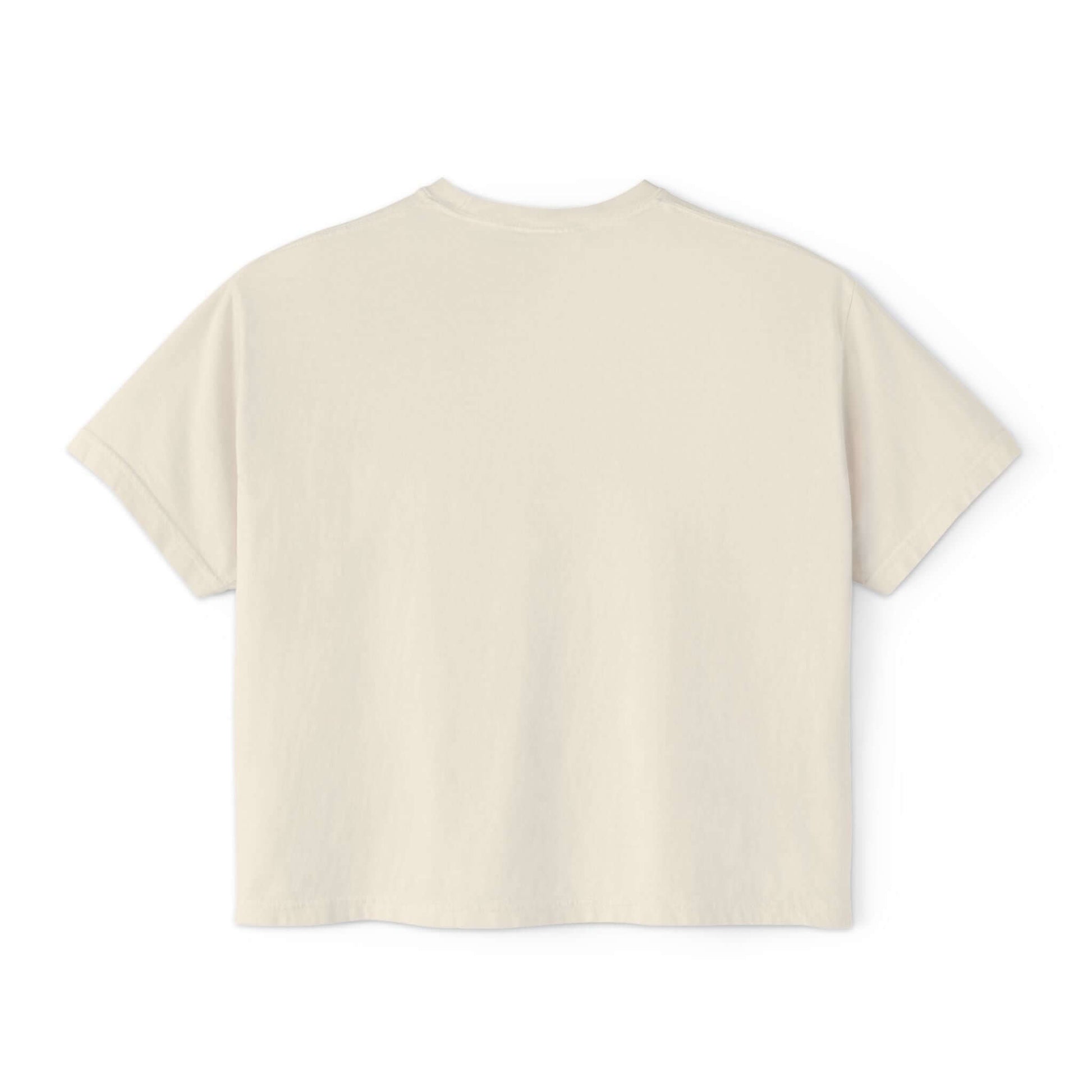 Back view of a boxy, short-sleeve women's tee shirt in soft beige, perfect for casual summer wear.