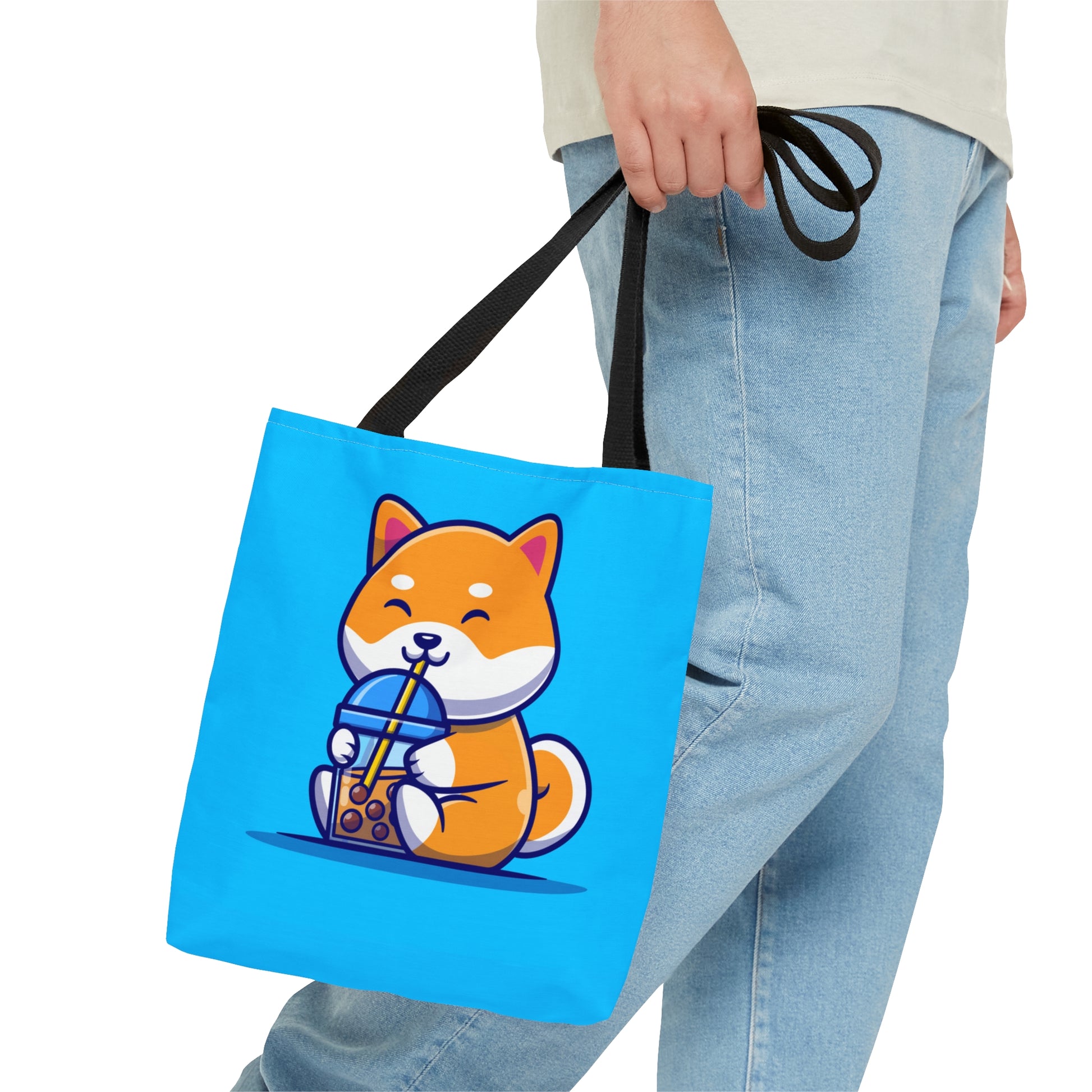 Man walking and holding Turquoise Bag with black Handles with orange shiba Inu sitting and drinking boba