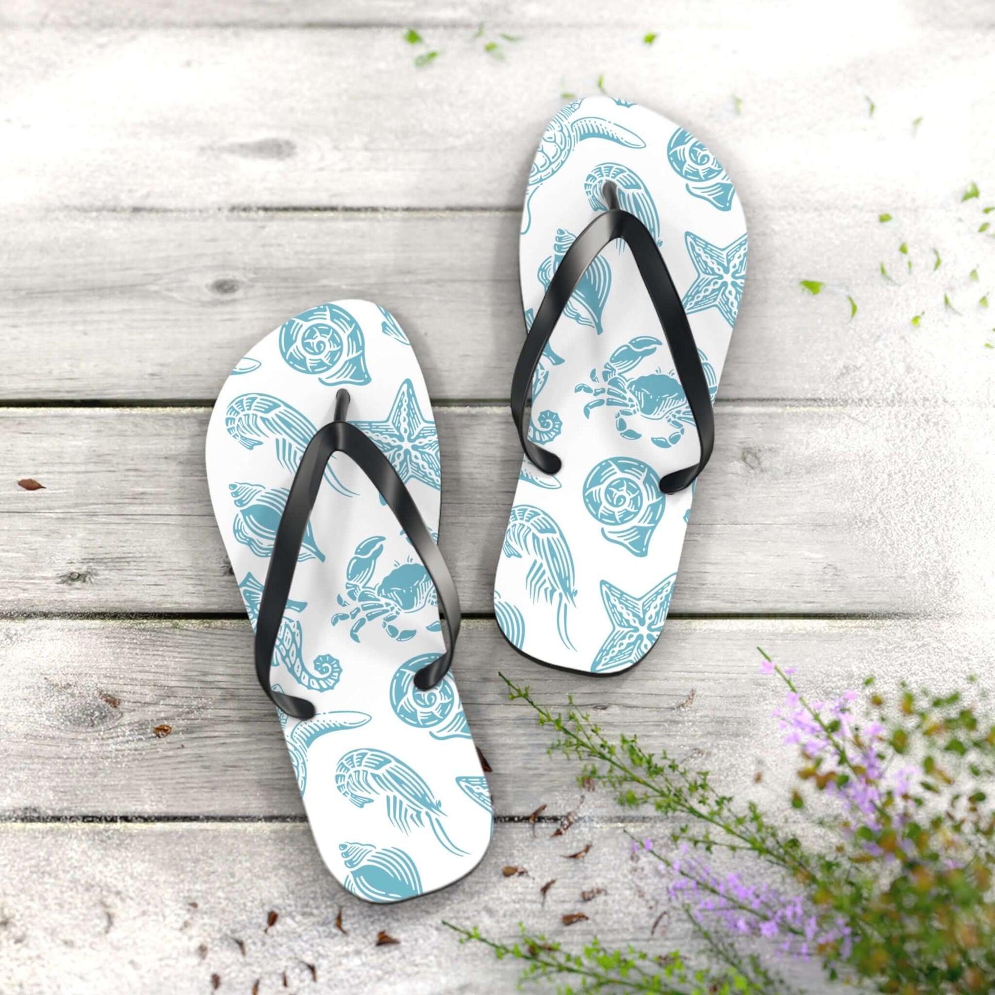 Turtle Beachy Flip Flops with nautical ocean shell print on a wooden surface, perfect for summer outings.