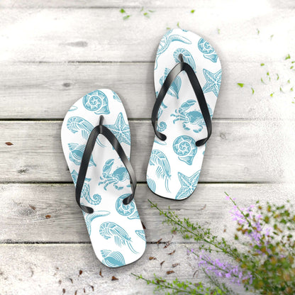 Turtle Beachy Flip Flops with nautical ocean shell print on a wooden surface, perfect for summer outings.