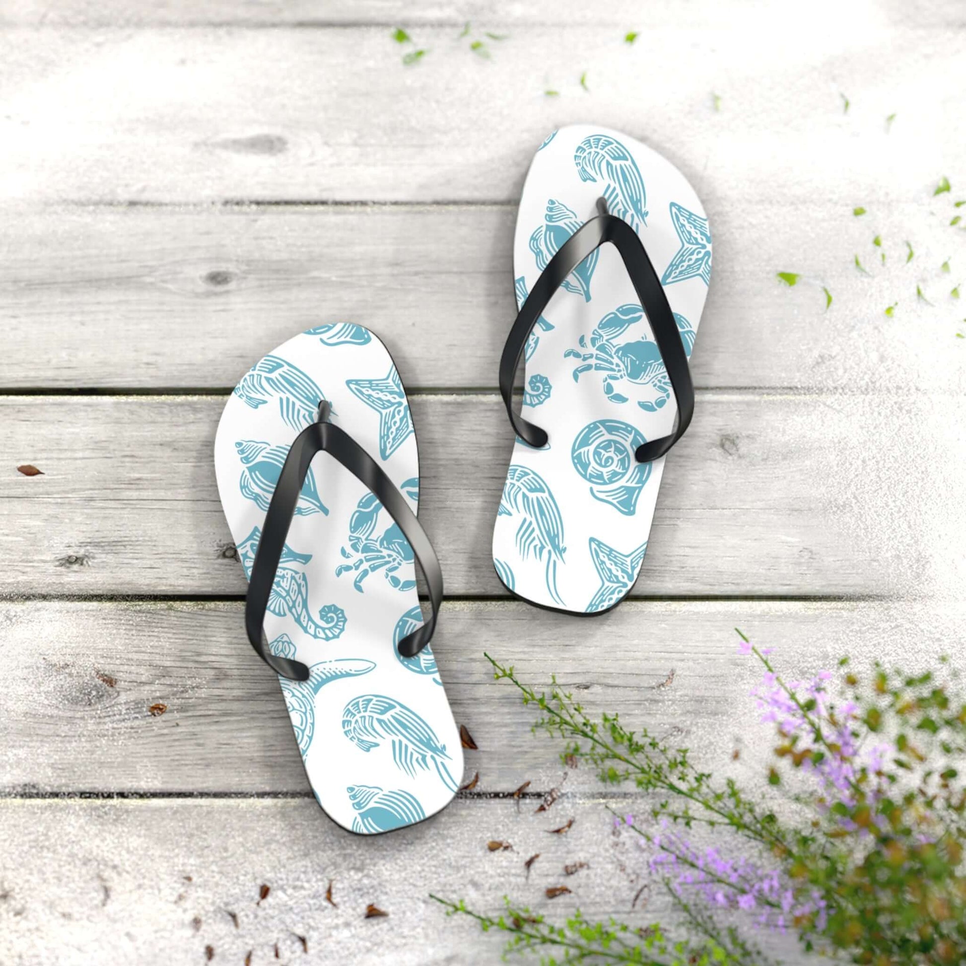 Nautical Turtle Beachy Flip Flops with sea turtles and shells design on a wooden surface, perfect for summer.