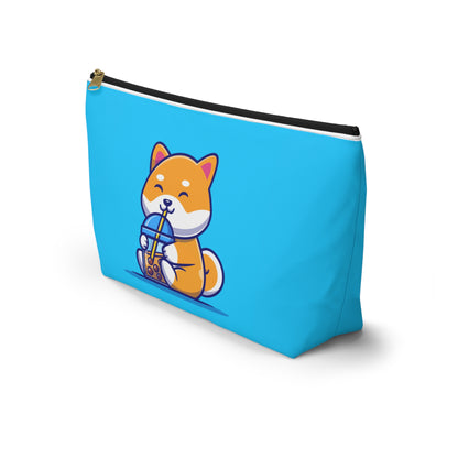 side view of Turquoise pouch with cute shiba inu drinking Boba design, black zipper