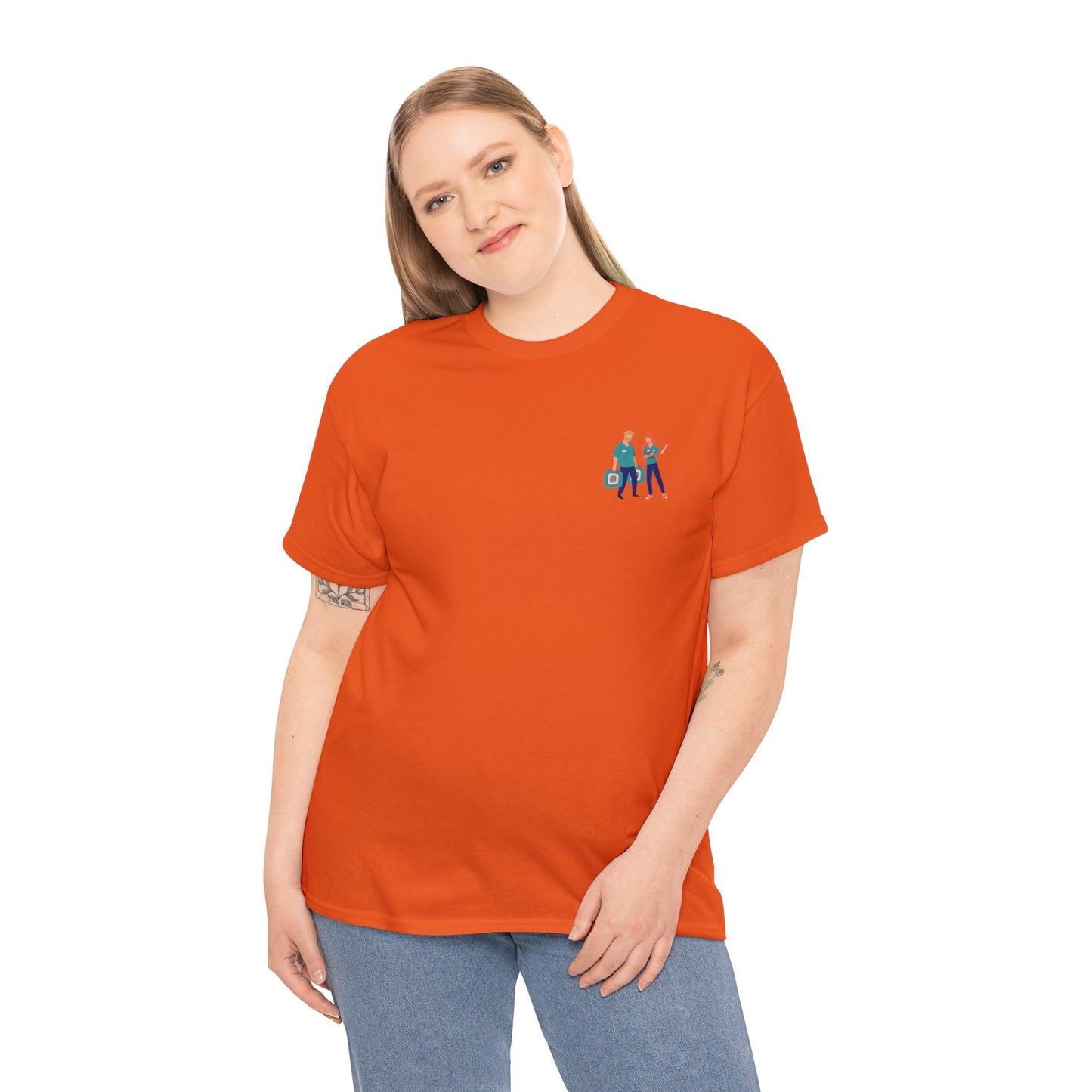 White woman with blonde hair wearing a orange t-shirt with a chest pocket image of two animal shelter workers. 