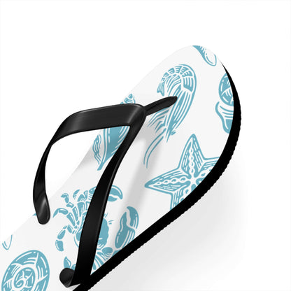 Close-up of Turtle Beachy Flip Flops with nautical ocean shell and sea creature print, ideal for summer fun.