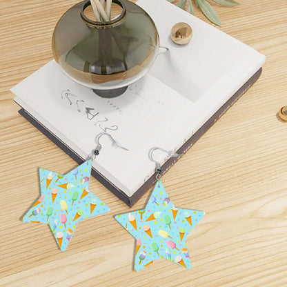 Mint leather star earrings with ice cream pattern, styled on a wooden surface with books and a vase.