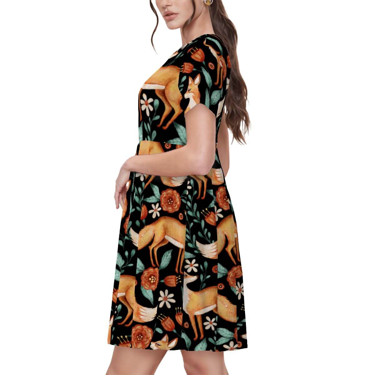 Black women’s t-shirt dress featuring a forest pattern with red foxes, flowers, and leaves, perfect for a witchy vibe.