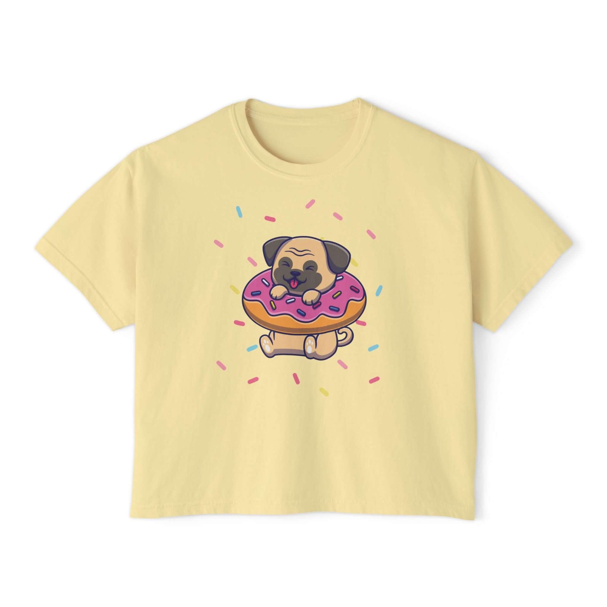 Cute yellow boxy tee with pug on a donut decorated with sprinkles, perfect for dog lovers and summer fun.