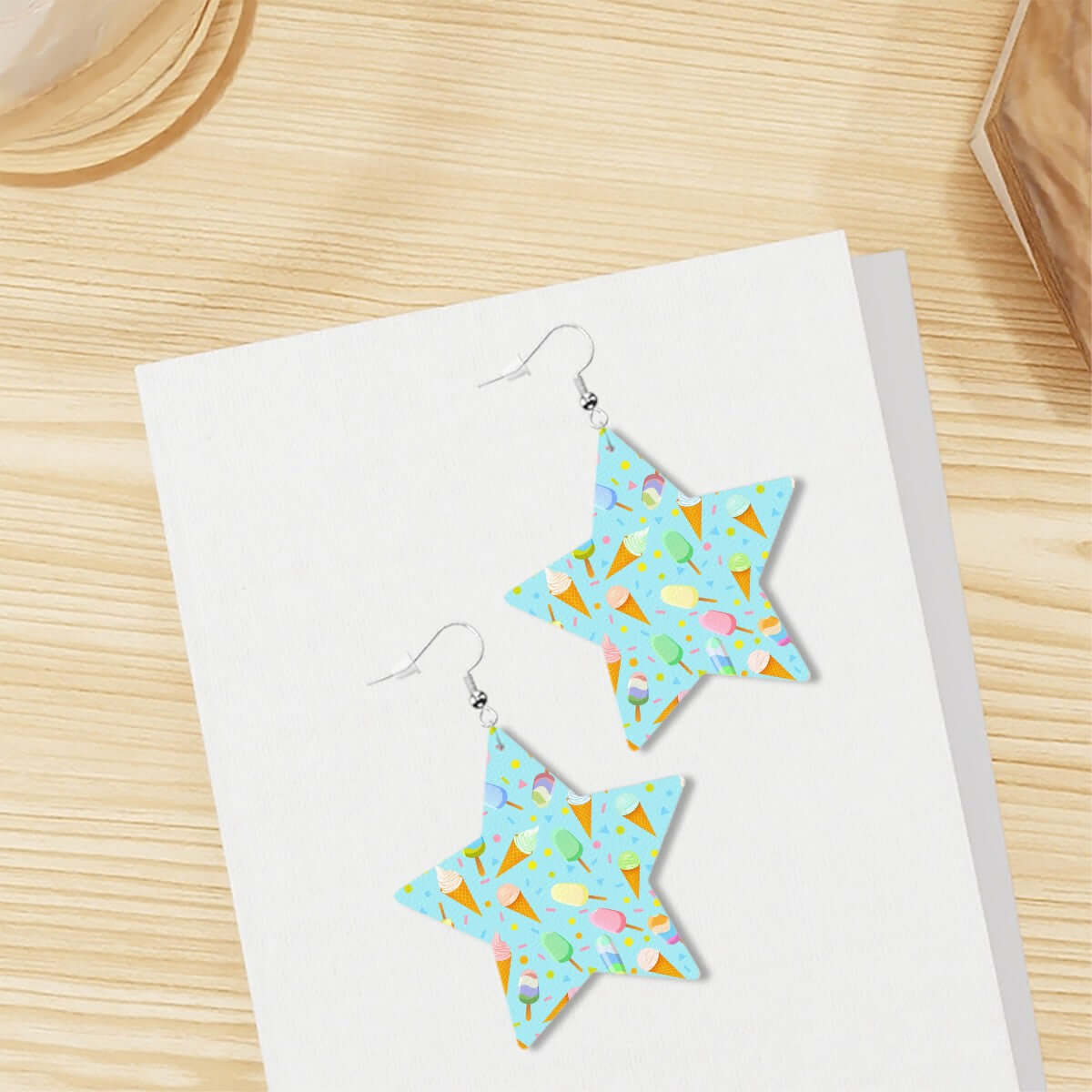 Mint leather star earrings featuring ice cream pattern on a pastel background, perfect for fun-loving fashionistas.
