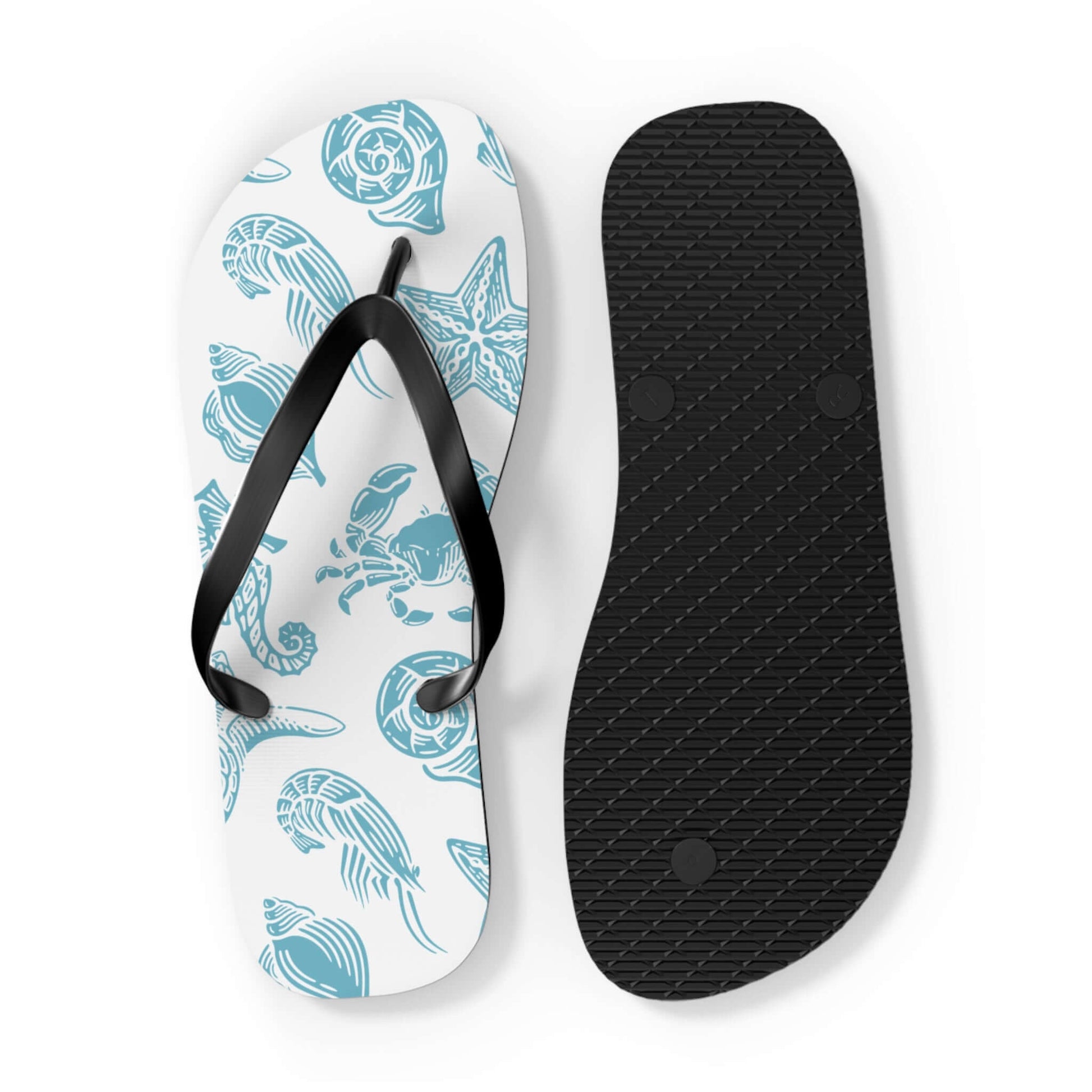 Turtle Beachy Flip Flops with ocean shell print, black straps, and non-slip sole for summer adventures.